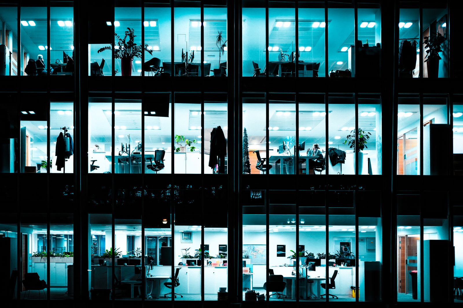 Illuminated modern office building at night